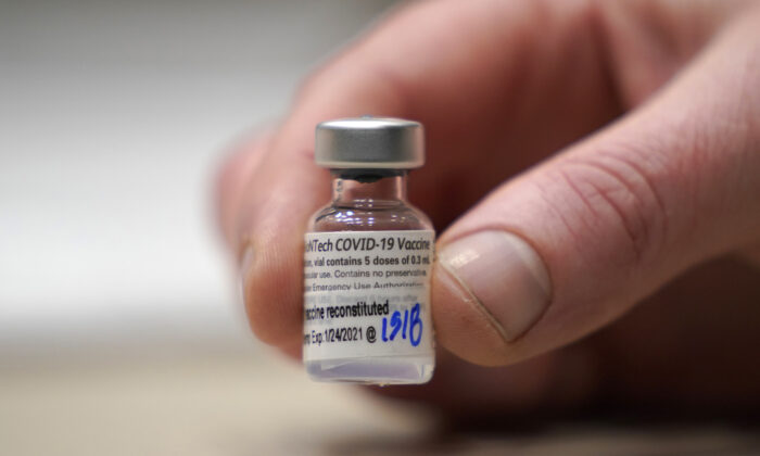A vial of the Pfizer vaccine for COVID-19 in Seattle, Wash., on Jan. 24, 2021. (Ted S. Warren/AP Photo)
