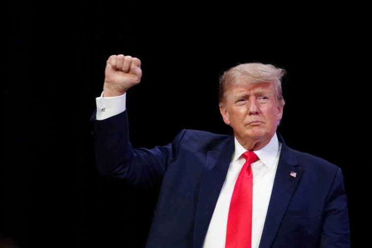 FILE PHOTO: Former U.S. president Donald Trump speaks to an audience at the "American Freedom Tour" event in Memphis, Tennessee, U.S., June 18, 2022. REUTERS/Karen Pulfer Focht/File Photo